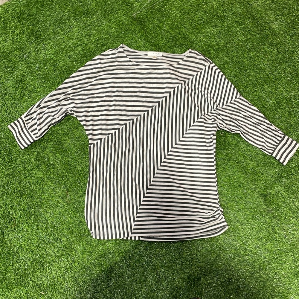 Ladies black and white striped knit top.